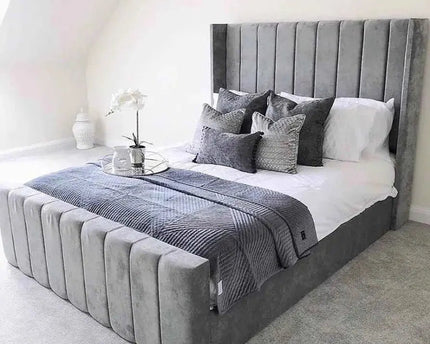 The Amor wingback bed with footboard side view