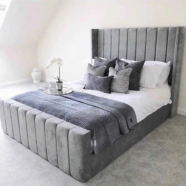 The Amor wingback bed with footboard side view