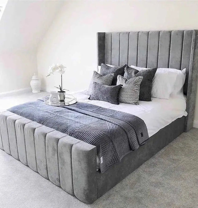 The Amor wingback bed with footboard side view