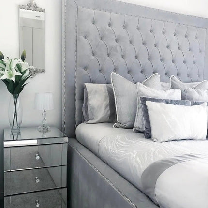 The supreme high lux bed with 18" high frame side view grey in colour